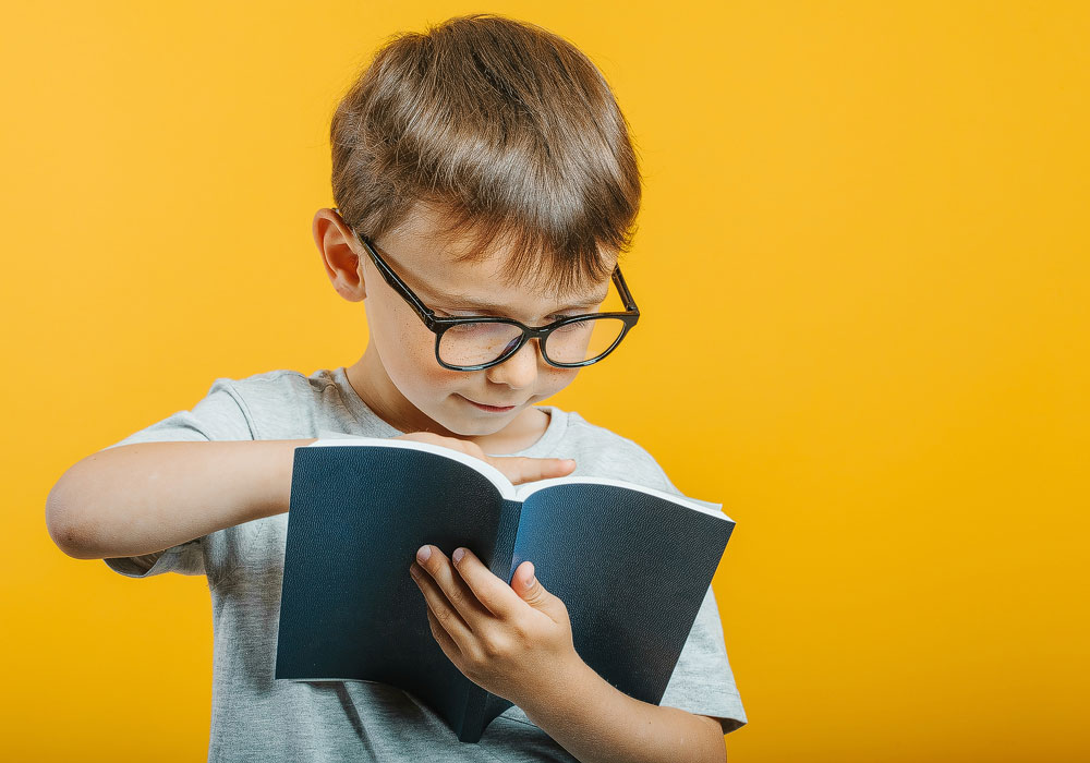 Kid reading book
